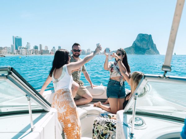 friends-toasting-drinks-boat-party